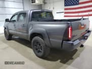 ✅ 2014 Toyota Tacoma • VIN: 5TFLU4EN1EX105836 • Lot: 81009515. Listed on Copart with 165,037 mi. Free auction sales archive from the USA and detailed vehicle history report at DreamBid. Image 2.