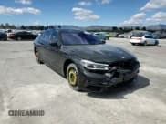 ✅ 2018 BMW 7 Series 750i • VIN: WBA7F0C5XJGM23016 • Лот: 51284255. Опубликован ранее на Copart с пробегом 69 460 миль. Бесплатный доступ к архиву аукционных продаж из США и подробный отчёт об истории автомобиля на DreamBid. Изображение 10.