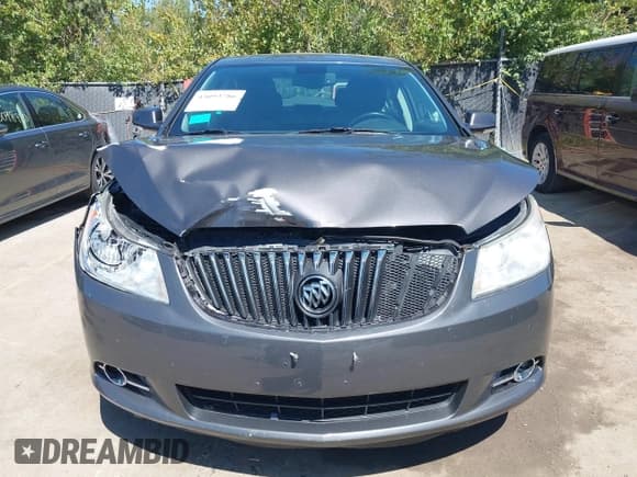 ✅ 2013 Buick LaCrosse Leather • VIN: 1G4GC5E30DF120367 • Лот: 43093786. Опубликован ранее на IAAI с пробегом 132 953 миль. Бесплатный доступ к архиву аукционных продаж из США и подробный отчёт об истории автомобиля на DreamBid. Изображение 12.