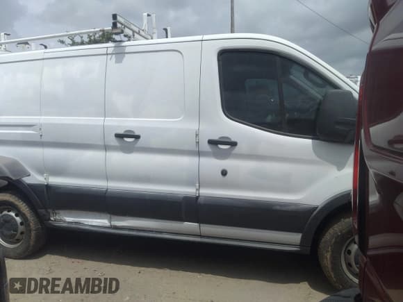 ✅ 2015 Ford Transit Cargo • VIN: 1FTNR1ZM7FKA45618 • Lot: 42365621. Listed on IAAI with 186,738 mi. Free auction sales archive from the USA and detailed vehicle history report at DreamBid. Image 13.
