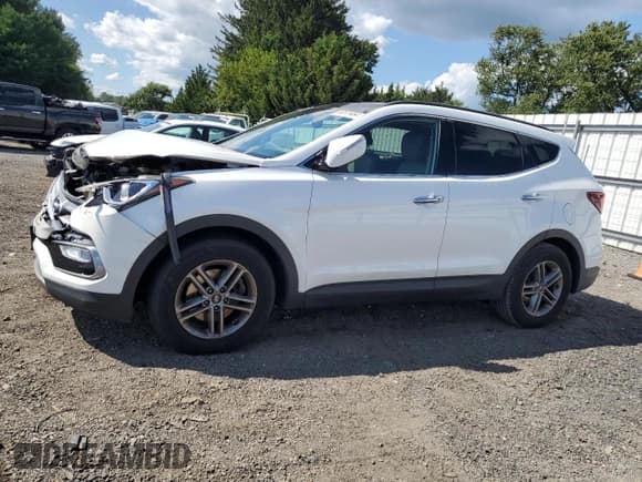 ✅ 2018 Hyundai Santa Fe 2.4L • VIN: 5XYZUDLB6JG518741 • Лот: 68501484. Опубликован ранее на Copart с пробегом 96 328 миль. Бесплатный доступ к архиву аукционных продаж из США и подробный отчёт об истории автомобиля на DreamBid. Изображение 1.