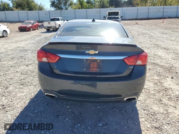 ✅ 2014 Chevrolet Impala LTZ • VIN: 1G1155S34EU131516 • Lot: 89529165. Listed on Copart with Not provided. Free auction sales archive from the USA and detailed vehicle history report at DreamBid. Image 6.