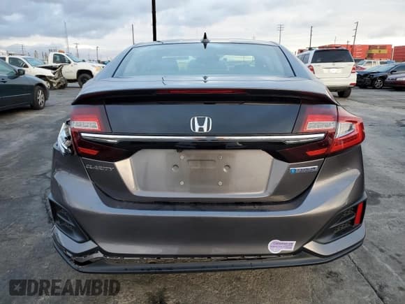✅ 2018 Honda Clarity • VIN: JHMZC5F18JC021690 • Lot: 42441643. Listed on Copart with 55,492 mi. Free auction sales archive from the USA and detailed vehicle history report at DreamBid. Image 6.
