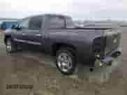 2010 Chevrolet Silverado 1500 LT with VIN 3GCRCSE02AG204959, listed as a Copart auction lot 82320935 with 118,013 mi miles and Salvage title. Bid and sale history available at DreamBid. Image 2.