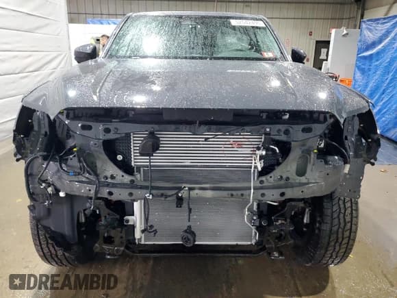 ✅ 2024 Toyota Tacoma TRD Sport Hybrid • VIN: 3TYLC5LN9RT014048 • Lot: 52542495. Listed on Copart with 8,775 mi. Free auction sales archive from the USA and detailed vehicle history report at DreamBid. Image 5.