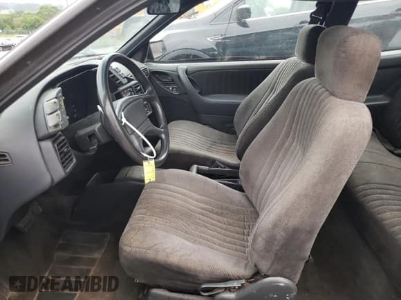 ✅ 1993 Pontiac Sunbird • VIN: 1G2JC14H4P7534125 • Lot: 62702385. Wystawiony na Copart z przebiegiem 123 102 mil. Bezpłatny archiwum sprzedaży aukcyjnych z USA i szczegółowy raport historii pojazdu na DreamBid. Zdjęcie 7.