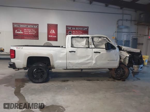 ✅ 2014 Chevrolet Silverado 1500 LT • VIN: 1GCUKREC1EF194139 • Lot: 43278109. Wystawiony na IAAI z przebiegiem 140 786 mil. Bezpłatny archiwum sprzedaży aukcyjnych z USA i szczegółowy raport historii pojazdu na DreamBid. Zdjęcie 14.