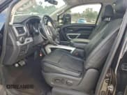 ✅ 2016 Nissan Titan Platinum Reserve • VIN: 1N6BA1F49GN513358 • Lot: 96068105. Listed on Copart with 84,665 mi. Free auction sales archive from the USA and detailed vehicle history report at DreamBid. Image 7.