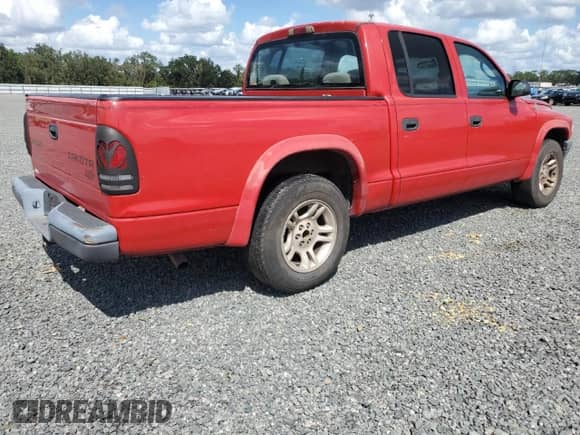 2003 Dodge Dakota Sport z VIN 1D7HL38X23S227220, wystawiony jako Copart lot #75947844 z przebiegiem Nie podano mil oraz Szkoda całkowita • Salvage title. Historia ofert i sprzedaży dostępna na DreamBid. Obrazek 3.