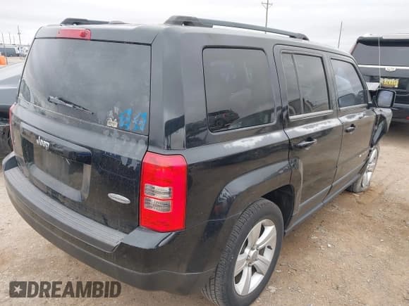✅ 2014 Jeep Patriot Latitude • VIN: 1C4NJPFA3ED547906 • Lot: 42146770. Listed on IAAI with 67,212 mi. Free auction sales archive from the USA and detailed vehicle history report at DreamBid. Image 4.