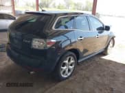 ✅ 2010 Mazda CX-7 Touring • VIN: JM3ER2W32A0339750 • Lot: 42248777. Listed on IAAI with 124,181 mi. Free auction sales archive from the USA and detailed vehicle history report at DreamBid. Image 4.