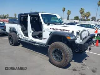 ✅ 2023 Jeep Gladiator Rubicon • VIN: 1C6JJTBG9PL576005 • Lot: 42961300. Listed on IAAI with 11,124 mi. Free auction sales archive from the USA and detailed vehicle history report at DreamBid. Image 1.