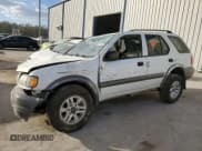 ✅ 2004 Isuzu Rodeo S • VIN: 4S2CK58Y244309017 • Lot: 83303294. Listed on Copart with 121,723 mi. Free auction sales archive from the USA and detailed vehicle history report at DreamBid. Image 1.