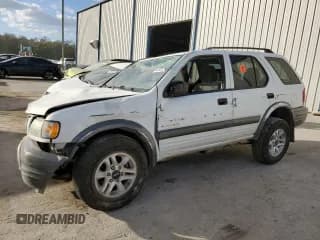 ✅ 2004 Isuzu Rodeo S • VIN: 4S2CK58Y244309017 • Lot: 83303294. Listed on Copart with 121,723 mi. Free auction sales archive from the USA and detailed vehicle history report at DreamBid. Image 1.