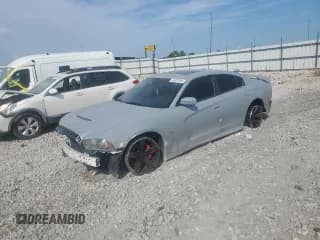 ✅ 2013 Dodge Charger SRT-8 • VIN: 2C3CDXEJ9DH521185 • Lot: 65207205. Wystawiony na Copart z przebiegiem 69 215 mil. Bezpłatny archiwum sprzedaży aukcyjnych z USA i szczegółowy raport historii pojazdu na DreamBid. Zdjęcie 1.