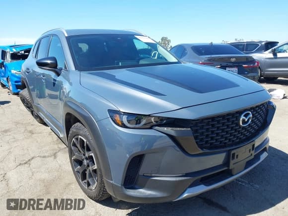 ✅ 2023 Mazda CX-50 Meridian Edition • VIN: 7MMVABXY6PN130517 • Lot: 42808080. Wystawiony na IAAI z przebiegiem 30 380 mil. Bezpłatny archiwum sprzedaży aukcyjnych z USA i szczegółowy raport historii pojazdu na DreamBid. Zdjęcie 1.