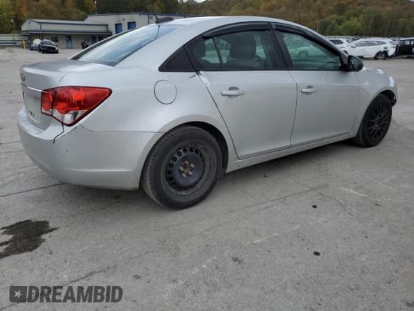 ✅ 2015 Chevrolet Cruze LS • VIN: 1G1PA5SG0F7169429 • Lot: 89809465. Listed on Copart with 114,787 mi. Free auction sales archive from the USA and detailed vehicle history report at DreamBid. Image 3.