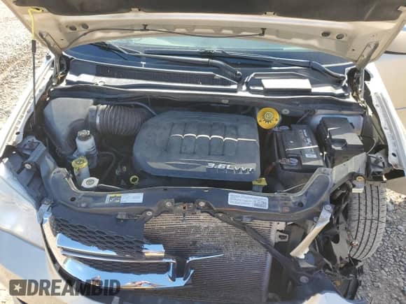 2014 Dodge Grand Caravan SXT с VIN 2C4RDGCG1ER429464, выставлен на аукционе Copart как лот 86646645 с пробегом 209 217 миль миль и Списание • Salvage title. История ставок и продаж доступна на DreamBid. Изображение 12.