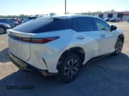 ✅ 2024 Lexus RZ 300e Premium • VIN: JTJABABB3RA002882 • Lot: 41262906. Listed on IAAI with 8,114 mi. Free auction sales archive from the USA and detailed vehicle history report at DreamBid. Image 4.