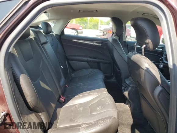 ✅ 2013 Ford Fusion Titanium Hybrid • VIN: 3FA6P0RU7DR309570 • Лот: 63838195. Опубликован ранее на Copart с пробегом 165 797 миль. Бесплатный доступ к архиву аукционных продаж из США и подробный отчёт об истории автомобиля на DreamBid. Изображение 10.