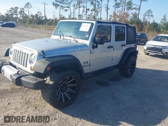 ✅ 2008 Jeep Wrangler Unlimited X • VIN: 1J4GA391X8L542610 • Lot: 43783217. Listed on IAAI with 203,955 mi. Free auction sales archive from the USA and detailed vehicle history report at DreamBid. Image 17.