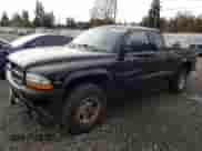 2000 Dodge Dakota Sport z VIN 1B7GG22N7YS611495, wystawiony jako Copart lot #77156084 z przebiegiem 179 247 mil mil oraz Szkoda całkowita • Salvage title. Historia ofert i sprzedaży dostępna na DreamBid. Obrazek 1.