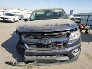 ✅ 2018 Chevrolet Colorado 4WD Z71 • VIN: 1GCGTDEN2J1313788 • Лот: 75254334. Опубликован ранее на Copart с пробегом 88 707 миль. Бесплатный доступ к архиву аукционных продаж из США и подробный отчёт об истории автомобиля на DreamBid. Изображение 5.