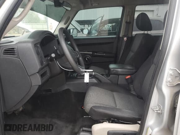 ✅ 2009 Jeep Commander Sport • VIN: 1J8HG48K79C511267 • Lot: 65707875. Listed on Copart with 190,767 mi. Free auction sales archive from the USA and detailed vehicle history report at DreamBid. Image 7.
