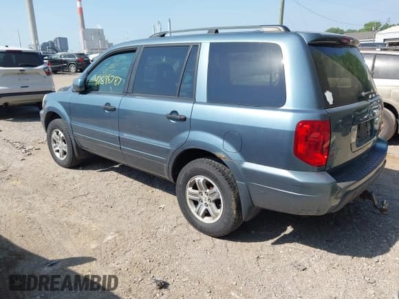 ✅ 2005 Honda Pilot EX-L • VIN: 2HKYF18765H571821 • Lot: 42586787. Listed on IAAI with 246,844 mi. Free auction sales archive from the USA and detailed vehicle history report at DreamBid. Image 3.