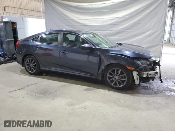 ✅ 2019 Honda Civic EX • VIN: 19XFC1F34KE004958 • Lot: 86621815. Listed on Copart with 36,603 mi. Free auction sales archive from the USA and detailed vehicle history report at DreamBid. Image 4.