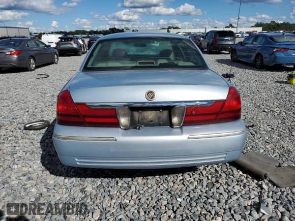 ✅ 2005 Mercury Grand Marquis GS • VIN: 2MEFM74W55X634465 • Лот: 86538745. Опубликован ранее на Copart с пробегом 119 513 миль. Бесплатный доступ к архиву аукционных продаж из США и подробный отчёт об истории автомобиля на DreamBid. Изображение 6.