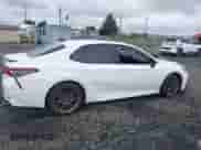 2023 Toyota Camry SE with VIN 4T1G11BKXPU103277, listed as a IAAI auction lot 41978396 with 66,624 mi miles and . Bid and sale history available at DreamBid. Image 13.