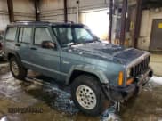 ✅ 1998 Jeep Cherokee Sport • VIN: 1J4FJ68S9WL241184 • Lot: 87360684. Listed on Copart with 257,954 mi. Free auction sales archive from the USA and detailed vehicle history report at DreamBid. Image 4.