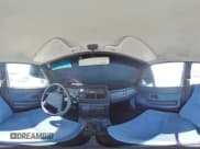 ✅ 1989 Volvo 240 DL • VIN: YV1AX8859K1836590 • Lot: 77685234. Wystawiony na Copart z przebiegiem 122 438 mil. Bezpłatny archiwum sprzedaży aukcyjnych z USA i szczegółowy raport historii pojazdu na DreamBid. Zdjęcie 13.