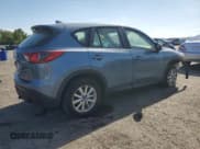 ✅ 2016 Mazda CX-5 Sport • VIN: JM3KE4BY1G0857403 • Lot: 80602595. Listed on Copart with 110,369 mi. Free auction sales archive from the USA and detailed vehicle history report at DreamBid. Image 3.