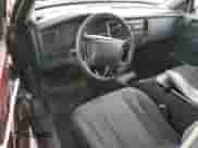 2002 Dodge Dakota z VIN 1B7FL16X22S668515, wystawiony jako Copart lot #78352644 z przebiegiem 214 222 mil mil oraz Szkoda całkowita • Salvage title. Historia ofert i sprzedaży dostępna na DreamBid. Obrazek 8.