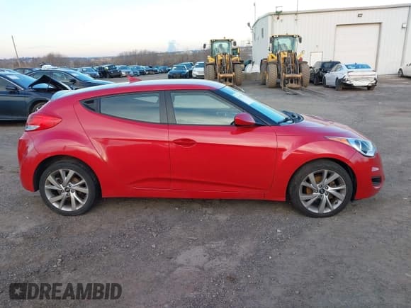 ✅ 2016 Hyundai Veloster • VIN: KMHTC6AD5GU268369 • Lot: 41235777. Listed on IAAI with 141,825 mi. Free auction sales archive from the USA and detailed vehicle history report at DreamBid. Image 13.