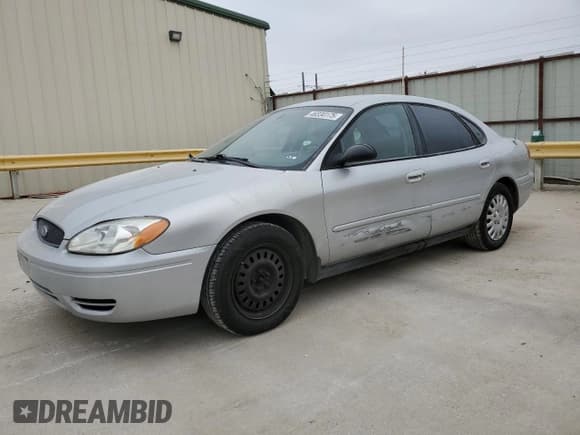 ✅ 2004 Ford Taurus LX • VIN: 1FAFP52224A203303 • Lot: 46334175. Listed on Copart with 158,832 mi. Free auction sales archive from the USA and detailed vehicle history report at DreamBid. Image 1.