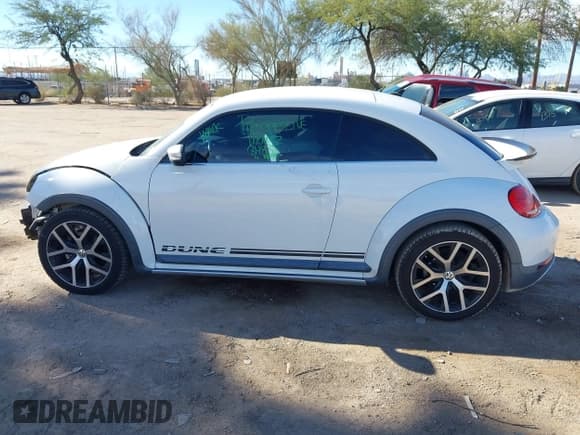 ✅ 2016 Volkswagen Beetle Dune • VIN: 3VWS17AT8GM632868 • Lot: 43810321. Listed on IAAI with 75,311 mi. Free auction sales archive from the USA and detailed vehicle history report at DreamBid. Image 15.