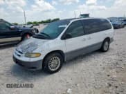 ✅ 1998 Dodge Caravan LE • VIN: 1B4GP54L0WB601480 • Lot: 61052765. Listed on Copart with 99,399 mi. Free auction sales archive from the USA and detailed vehicle history report at DreamBid. Image 1.