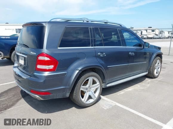✅ 2012 Mercedes-Benz GL 550 • VIN: 4JGBF8GE7CA782332 • Lot: 42668628. Listed on IAAI with 140,870 mi. Free auction sales archive from the USA and detailed vehicle history report at DreamBid. Image 4.