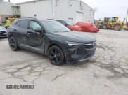 ✅ 2021 Buick Envision Essence • VIN: LRBFZPR42MD099979 • Lot: 41557999. Listed on IAAI with 80,572 mi. Free auction sales archive from the USA and detailed vehicle history report at DreamBid. Image 1.