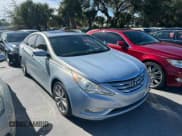 ✅ 2013 Hyundai Sonata SE • VIN: 5NPEC4AC9DH589037 • Lot: 92728965. Listed on Copart with 170,026 mi. Free auction sales archive from the USA and detailed vehicle history report at DreamBid. Image 1.