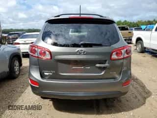 2012 Hyundai Santa Fe Limited с VIN 5XYZK4AG4CG136277, выставлен на аукционе Copart как лот 71356364 с пробегом 77 940 миль миль и На запчасти • Non repairable. История ставок и продаж доступна на DreamBid. Изображение 6.