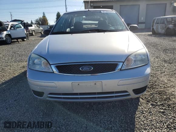 ✅ 2006 Ford Focus S • VIN: 1FAFP34N66W120345 • Lot: 87309565. Wystawiony na Copart z przebiegiem 152 618 mil. Bezpłatny archiwum sprzedaży aukcyjnych z USA i szczegółowy raport historii pojazdu na DreamBid. Zdjęcie 5.