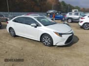 ✅ 2022 Toyota Corolla Hybrid LE • VIN: JTDEAMDE6N3010618 • Lot: 43651751. Wystawiony na IAAI z przebiegiem 21 429 mil. Bezpłatny archiwum sprzedaży aukcyjnych z USA i szczegółowy raport historii pojazdu na DreamBid. Zdjęcie 1.