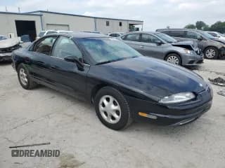 ✅ 1995 Oldsmobile Aurora • VIN: 1G3GR62C8S4143269 • Lot: 59577555. Wystawiony na Copart z przebiegiem 112 650 mil. Bezpłatny archiwum sprzedaży aukcyjnych z USA i szczegółowy raport historii pojazdu na DreamBid. Zdjęcie 4.