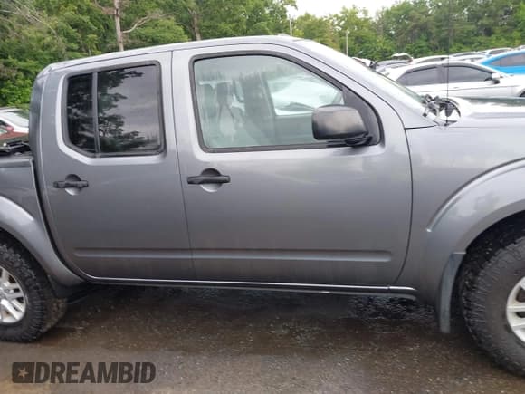 ✅ 2018 Nissan Frontier SV • VIN: 1N6AD0EV4JN726457 • Lot: 42348883. Listed on IAAI with 97,880 mi. Free auction sales archive from the USA and detailed vehicle history report at DreamBid. Image 13.