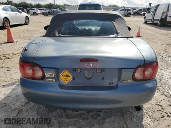 ✅ 2005 Mazda MX-5 Miata Cloth • VIN: JM1NB353250410343 • Лот: 73766474. Опубликован ранее на Copart с пробегом Не указан. Бесплатный доступ к архиву аукционных продаж из США и подробный отчёт об истории автомобиля на DreamBid. Изображение 6.