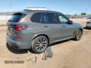 ✅ 2024 BMW X5 M60i • VIN: 5UX33EU09R9S87907 • Lot: 62863835. Wystawiony na Copart z przebiegiem 20 949 mil. Bezpłatny archiwum sprzedaży aukcyjnych z USA i szczegółowy raport historii pojazdu na DreamBid. Zdjęcie 3.